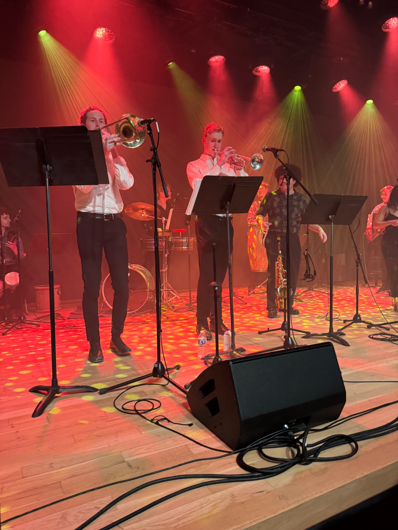 The Orquesta Afinke horn section performing live