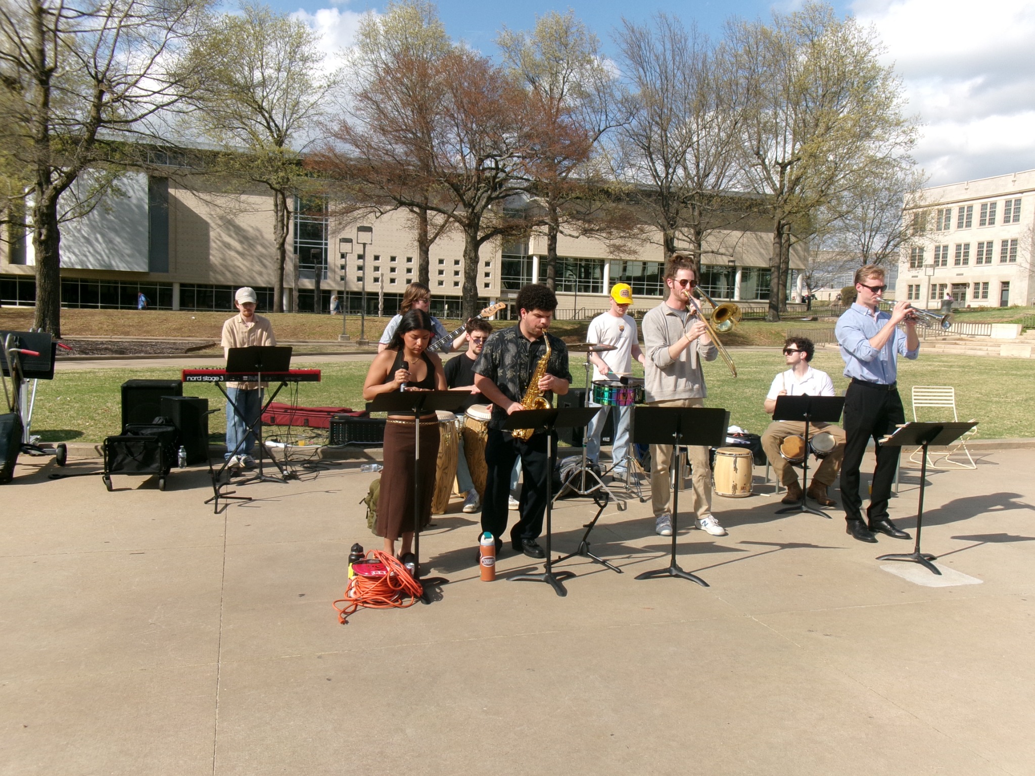 Orquesta Afinke performing outdoors at the University of Arkansas